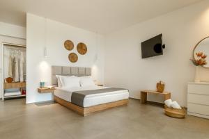 Postel nebo postele na pokoji v ubytování Ninemia Luxury Residence + 37 fotografií