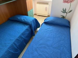 Postel nebo postele na pokoji v ubytování Viola lido adriano