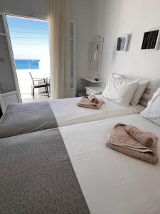 A bed or beds in a room at Vavanos Studios