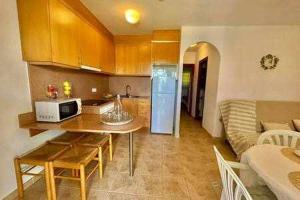 Kuchyň nebo kuchyňský kout v ubytování SON BOU Apartamento en planta baja junto la playa