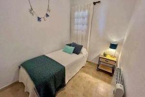 Postel nebo postele na pokoji v ubytování SON BOU Apartamento en planta baja junto la playa