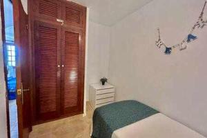 Postel nebo postele na pokoji v ubytování SON BOU Apartamento en planta baja junto la playa