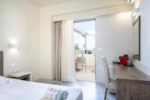 Voodi või voodid majutusasutuse Harmony Rethymno Beach toas