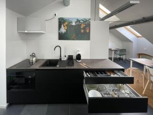 Η κουζίνα ή μικρή κουζίνα στο Atelier Stare Miasto +6 φωτογραφίες