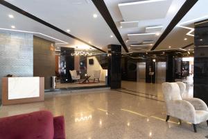 Posezení v ubytování Hotel Abastos Plaza