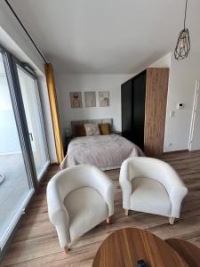 Ruang duduk di Serenity Apartament
