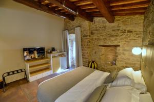 Postel nebo postele na pokoji v ubytování Rooms in Spello