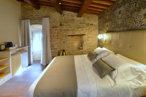 Postel nebo postele na pokoji v ubytování Rooms in Spello