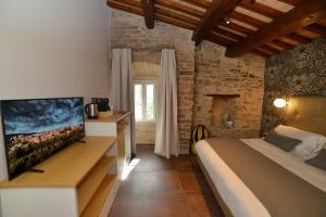 Postel nebo postele na pokoji v ubytování Rooms in Spello