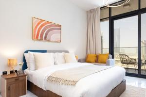 Postel nebo postele na pokoji v ubytování Bloomfields Tranquil Stu Al Maryah Vista + 28 fotografií