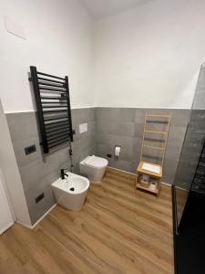 a bathroom with a sink and a toilet in it at Nas's House in Ronciglione +14 photos