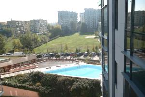 a view of a swimming pool from a building at Dunai panoráma in Budapest