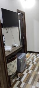 Μια τηλεόραση ή/και κέντρο ψυχαγωγίας στο Hotel giathinh +3 φωτογραφίες