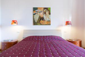 Postel nebo postele na pokoji v ubytování Guest House Le Acacie