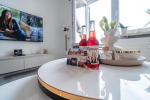 TV/Unterhaltungsangebot in der Unterkunft Gemütliche Ferienwohnung mit Berg und Alpsee Panorama im Allgäu