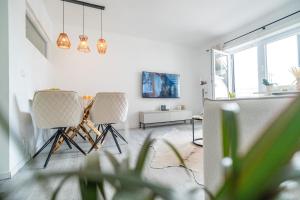 TV/Unterhaltungsangebot in der Unterkunft Gemütliche Ferienwohnung mit Berg und Alpsee Panorama im Allgäu
