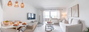 TV/Unterhaltungsangebot in der Unterkunft Gemütliche Ferienwohnung mit Berg und Alpsee Panorama im Allgäu