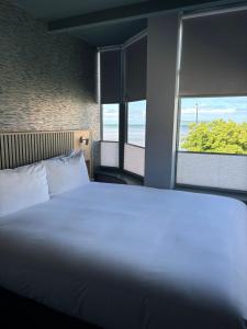 Postel nebo postele na pokoji v ubytování Carraig Townhouse