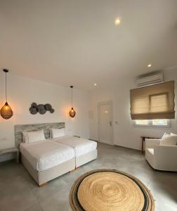 Posteľ alebo postele v izbe v ubytovaní Anna-Maria Mykonos Hotel