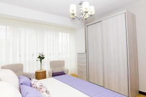 Postel nebo postele na pokoji v ubytování Casa Papín