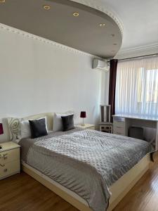 Postel nebo postele na pokoji v ubytování Beauty Complex