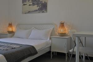 Ένα ή περισσότερα κρεβάτια σε δωμάτιο στο Gongxi Homestay Bell Tower Big Wild Goose Pagoda Tang Dynasty City Terracotta Warriors