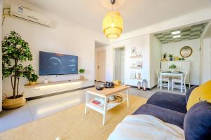 Μια τηλεόραση ή/και κέντρο ψυχαγωγίας στο Gongxi Homestay Bell Tower Big Wild Goose Pagoda Tang Dynasty City Terracotta Warriors