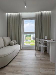 Posezení v ubytování GOLD Apartment - Lotnisko Pyrzowice-Katowice