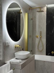 Koupelna v ubytování GOLD Apartment - Lotnisko Pyrzowice-Katowice