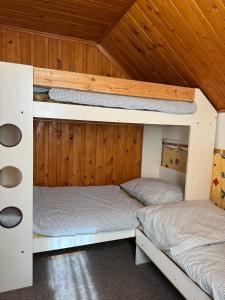 Ein Bett oder Betten in einem Zimmer der Unterkunft Chata Renďo