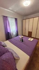 Postel nebo postele na pokoji v ubytování Apartman Štefan