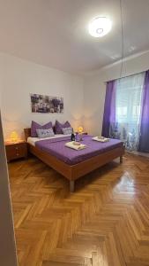 Postel nebo postele na pokoji v ubytování Apartman Štefan
