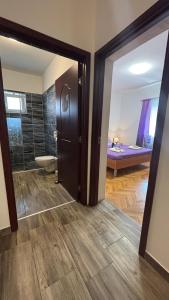 Postel nebo postele na pokoji v ubytování Apartman Štefan
