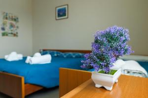 Postel nebo postele na pokoji v ubytování {Lux Kobler} - Luminoso Appartamento Fronte mare