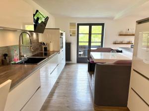 Η κουζίνα ή μικρή κουζίνα στο Großzügiges Allgäu Loft - Maisonette Style