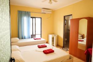 Postel nebo postele na pokoji v ubytování Haka Guesthouse