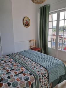 Postel nebo postele na pokoji v ubytování La maison de Ja