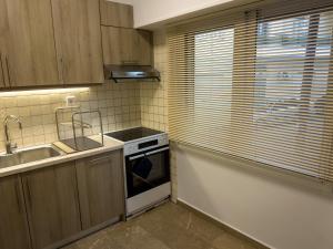 Kuchyň nebo kuchyňský kout v ubytování Daphnes home - Chalkida + 9 fotografií
