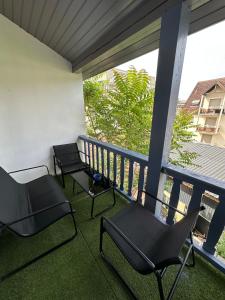 En balkon eller terrasse på Appart City