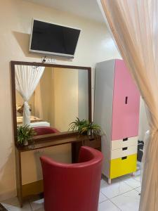 TV a/nebo společenská místnost v ubytování Breezebay Pool hotel