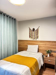 Postel nebo postele na pokoji v ubytování Hotel Litan Machu Picchu