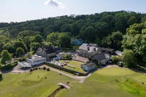 an aerial view of a large house with a park at The Bluebell - Luxury Lodge with Hot Tub in Penally
