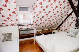 Postel nebo postele na pokoji v ubytování Hostel Centar