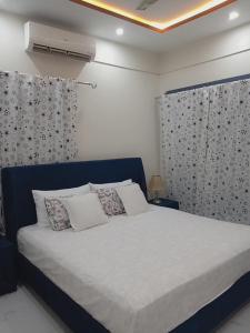 Ένα ή περισσότερα κρεβάτια σε δωμάτιο στο SM dream Lodges One Private Room