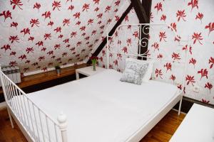 Postel nebo postele na pokoji v ubytování Hostel Centar