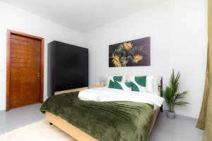 Ένα ή περισσότερα κρεβάτια σε δωμάτιο στο TCC Dzorwulu Apartment