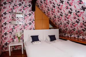 Postel nebo postele na pokoji v ubytování Hostel Centar