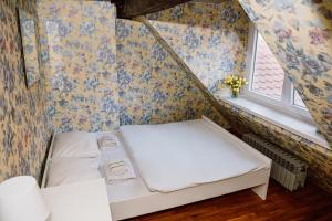 Postel nebo postele na pokoji v ubytování Hostel Centar