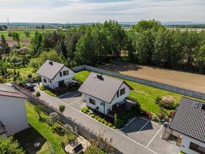 an aerial view of a house with a yard at Energylandia Apartamenty u Agi D in Zator