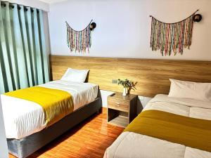 Postel nebo postele na pokoji v ubytování Hotel Litan Machu Picchu
